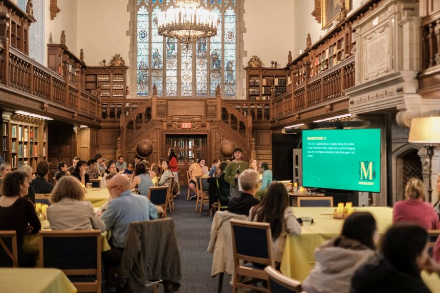 Folger Shakespeare Library with groups of people in for a lecture or trivia 