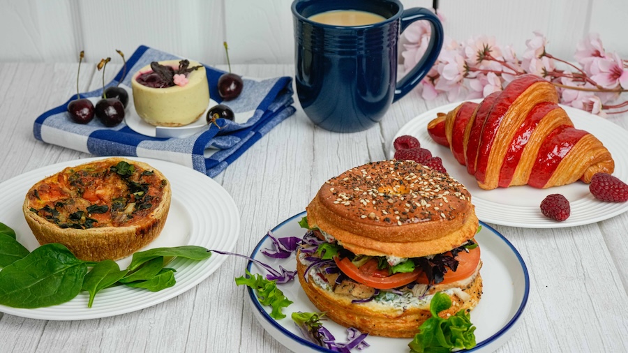 Fresh Baguette’s menu features quiche, a bagel sandwich, raspberry croissant, dessert, and coffee in Washington, DC.