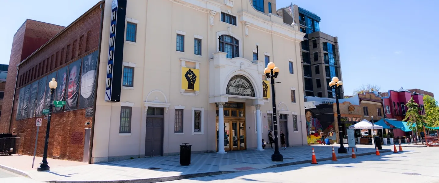 An exterior shot of a city block in Shaw, featuring the Howard Theatre.