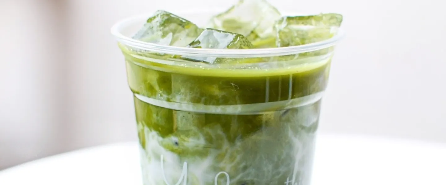 A to-go cup of silky matcha and ice.